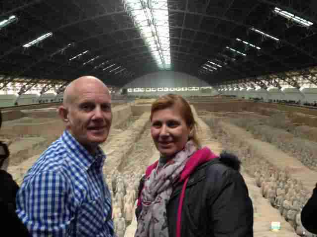 clients taking a pic at terracotta warriors